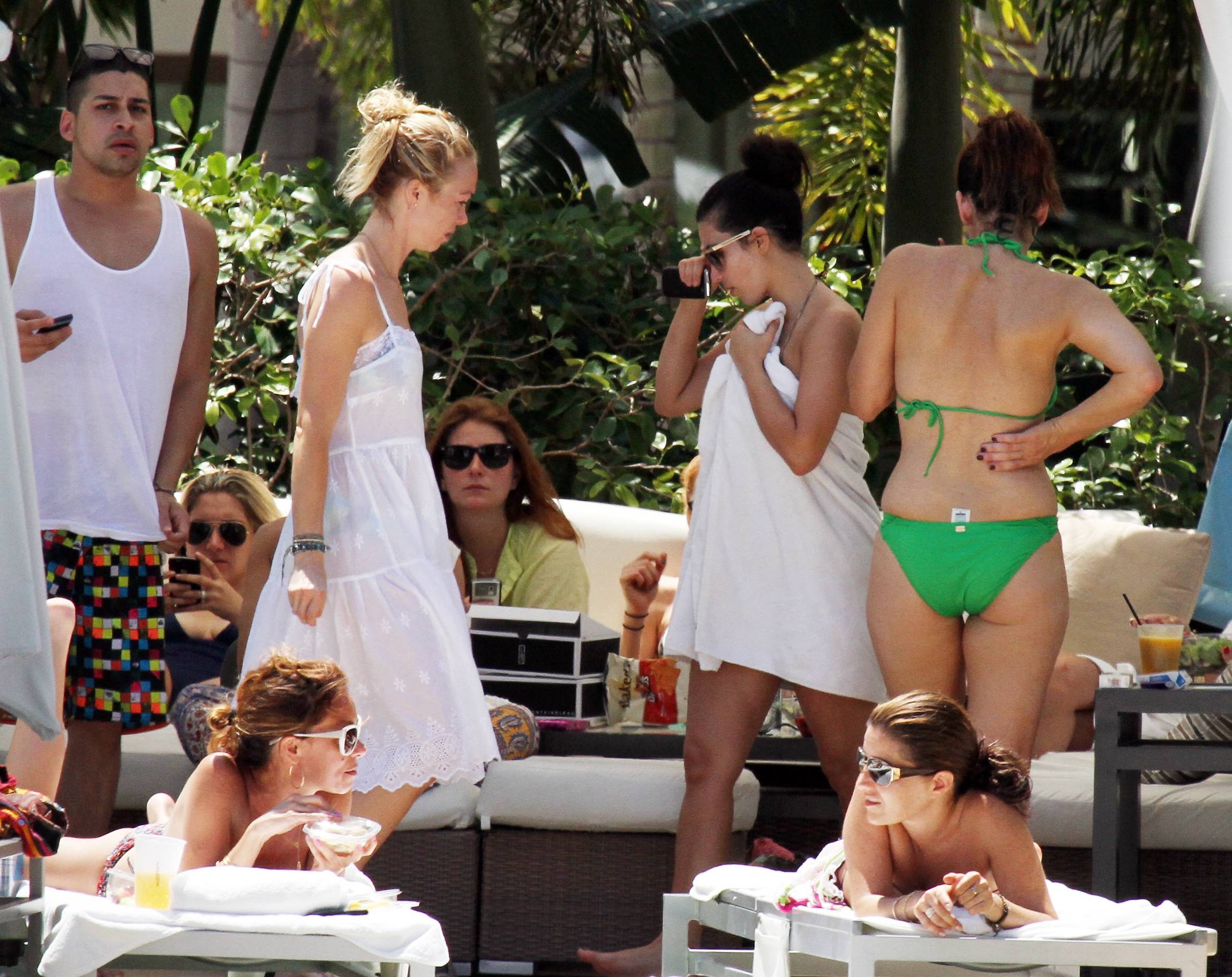 Christina_Aguilera_and_Kim_Kardashian_lounge_by_the_pool_for_a_friends_bachelor_party_at_the_Fountainebleau_in_Miami_-_June_12_-_Christina_Aguilera_Daily_00047.jpg