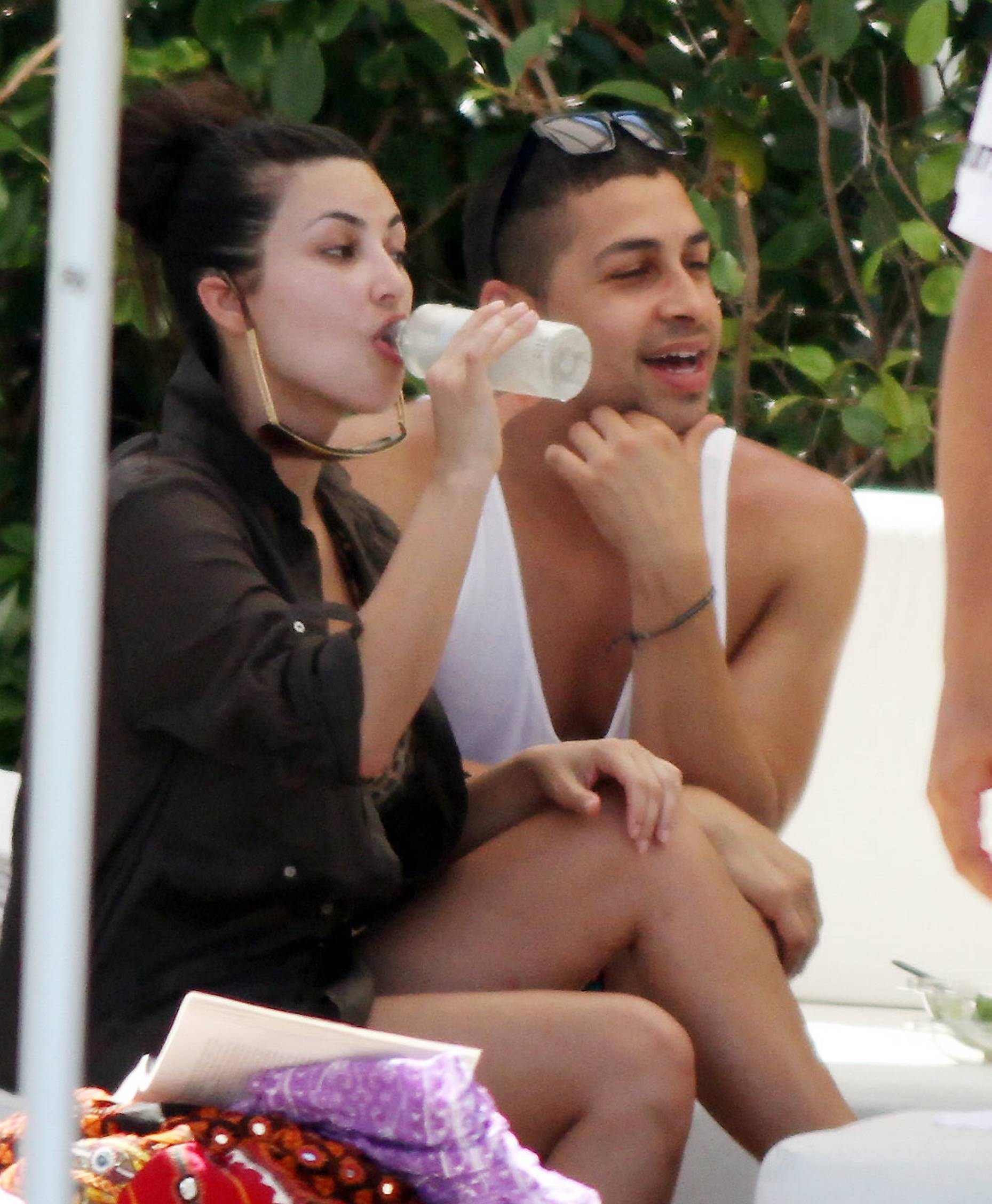 Christina_Aguilera_and_Kim_Kardashian_lounge_by_the_pool_for_a_friends_bachelor_party_at_the_Fountainebleau_in_Miami_-_June_12_-_Christina_Aguilera_Daily_00114.jpg
