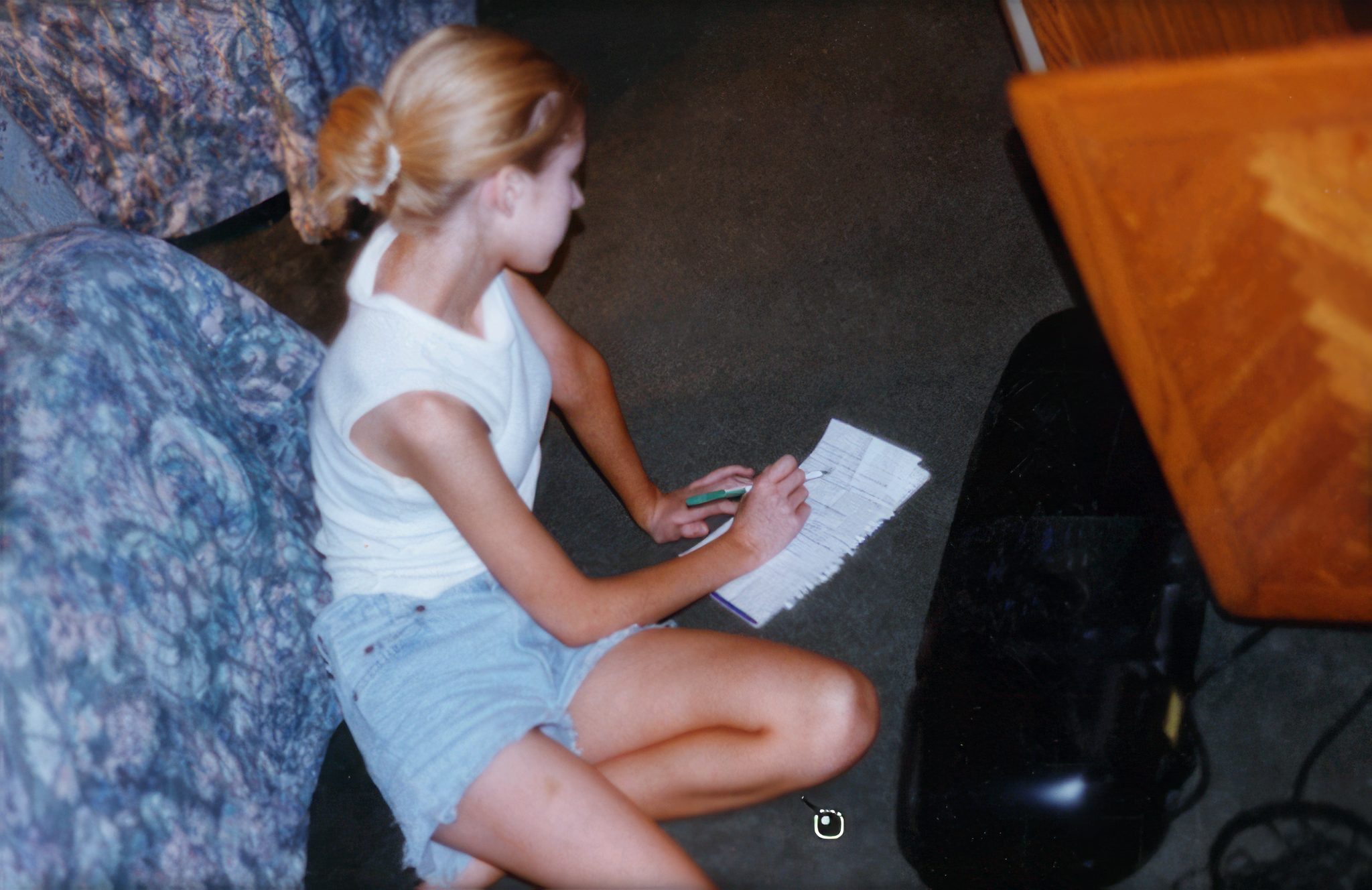 Age 15, writing songs in her spare time.
