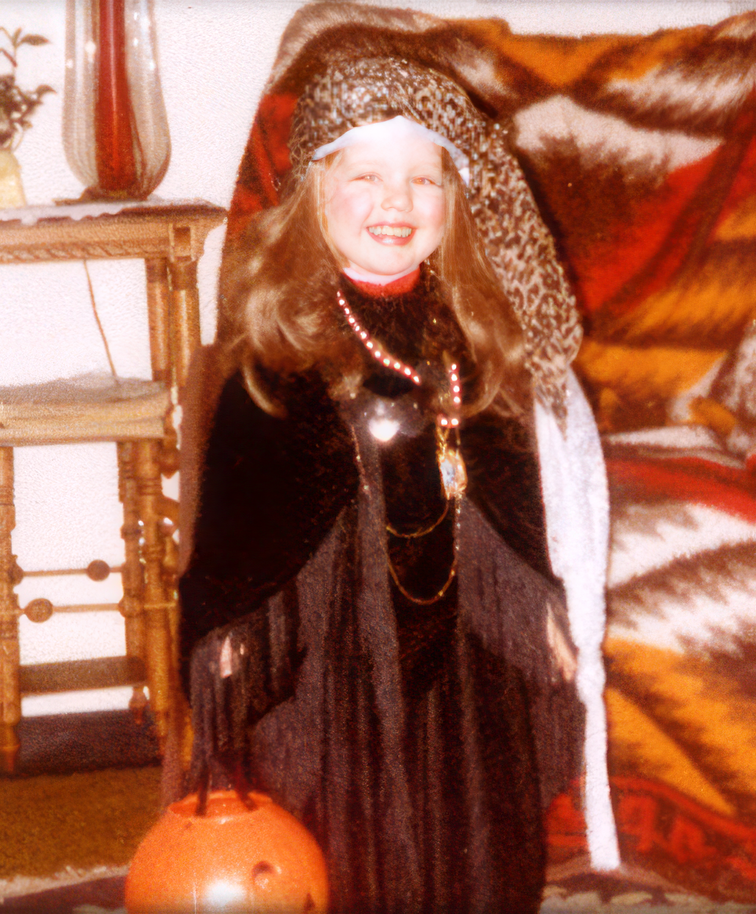At Grandmother's house, dressed up as a gypsy for Halloween, age 5.
At Grandmother's house, dressed up as a gypsy for Halloween, age 5.