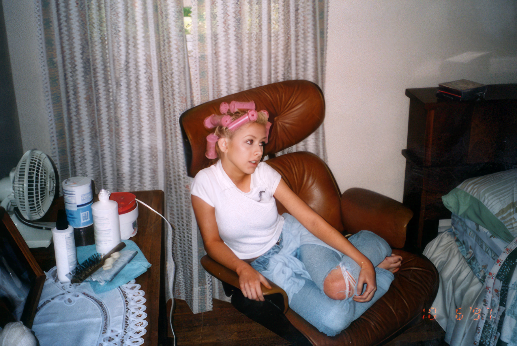 Christina, age 15, getting ready to go out with friends.
