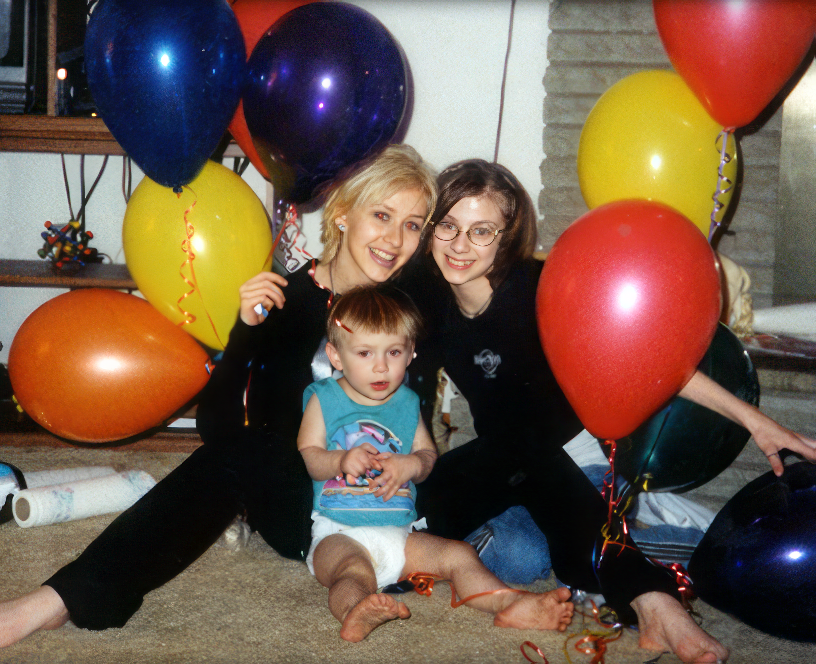 Michael and Rachel celebrate Christina's return home after she recorded "Reflection" for Disney's Mulan soundtrack. Age 17. 
