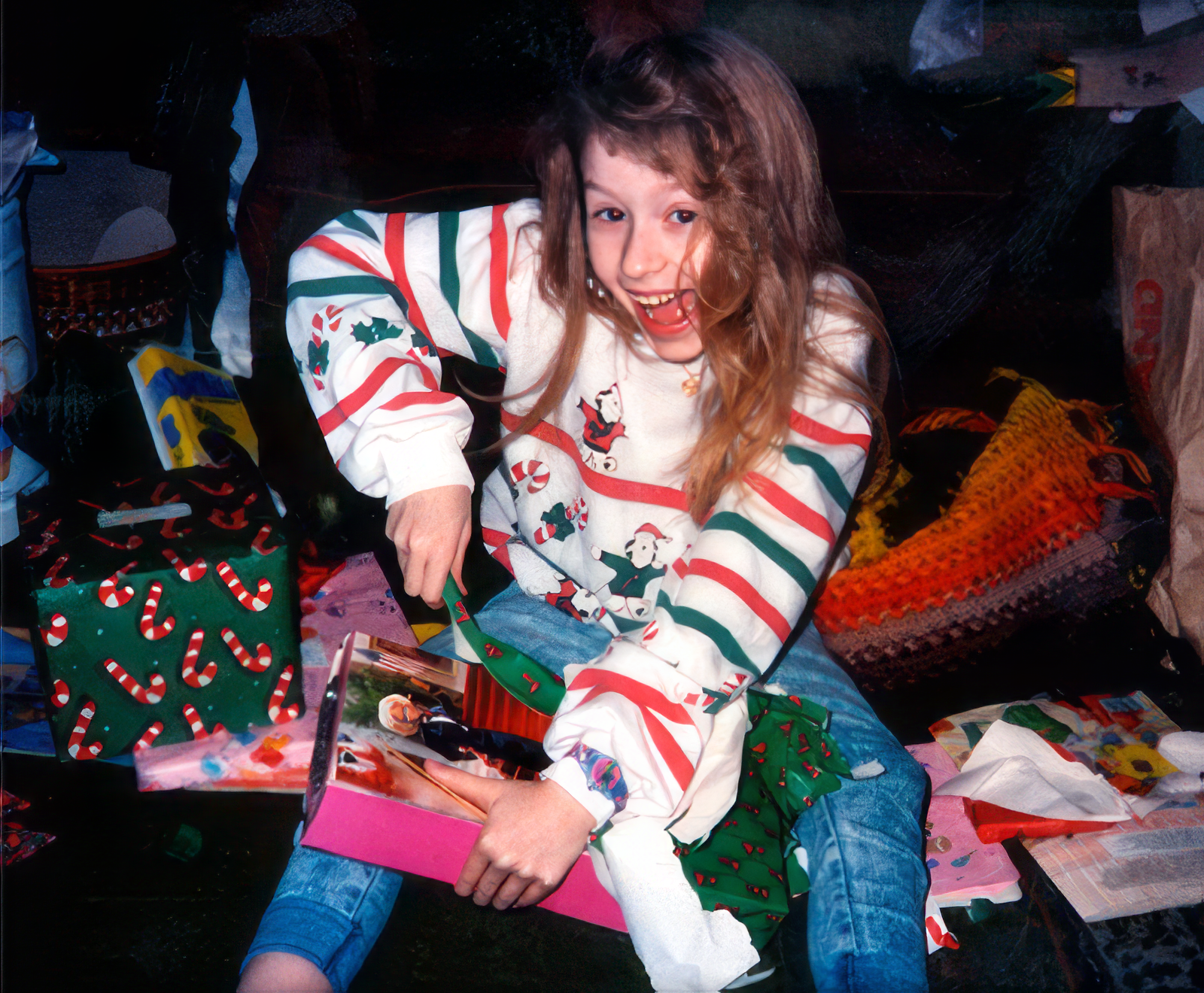 Christina, age 10, opening Christmas presents at Grandma's.
