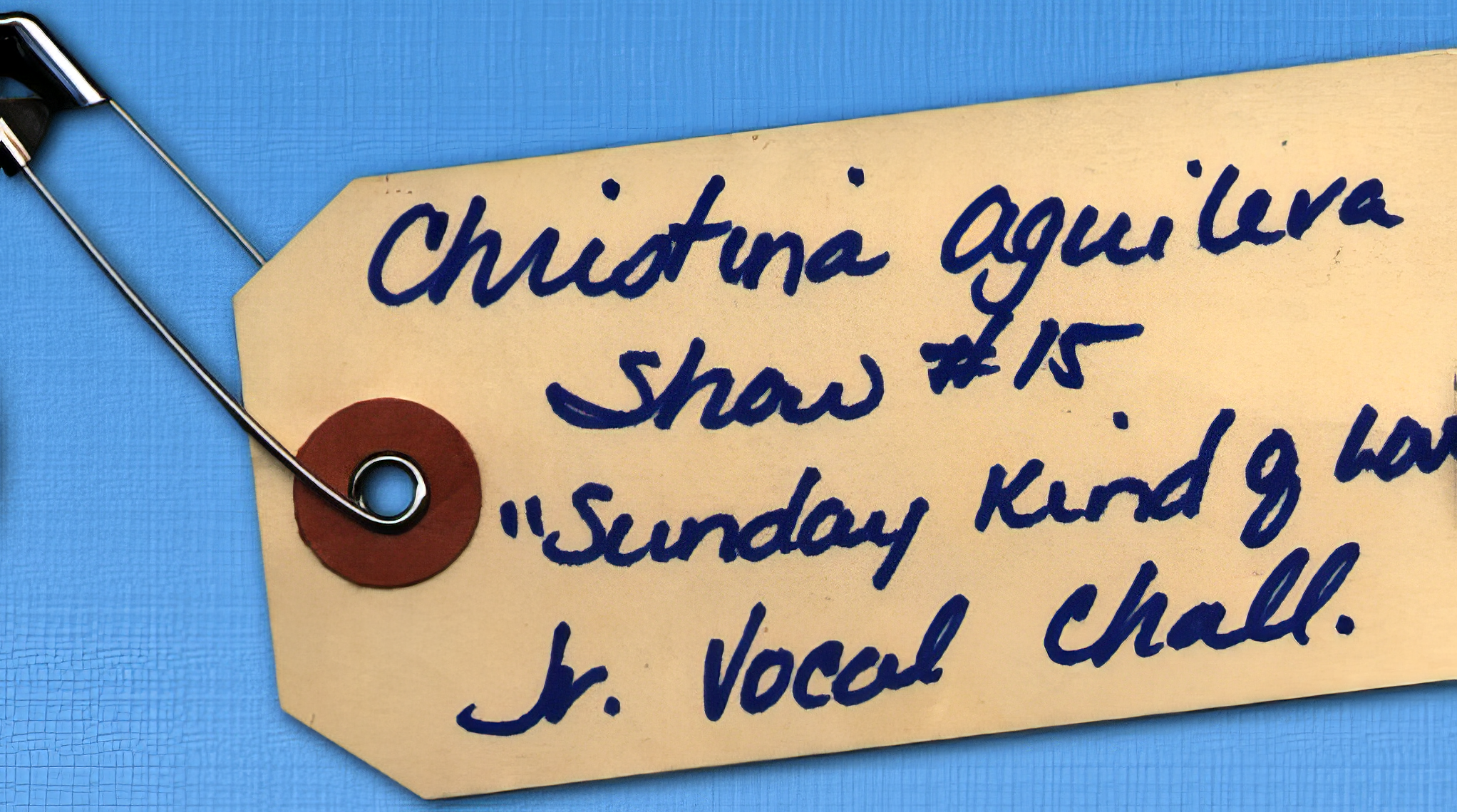 The tag attached to Christina's custome for her Star Search appearance. She competed in the Junior Vocalist Challenge category on the show.
