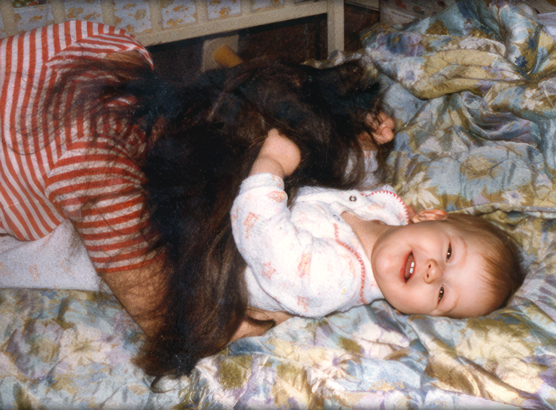 Christina being tickled by her mother. October, 1981, Rochester, Pennsylvania.
Christina being tickled by her mother. October, 1981, Rochester, Pennsylvania.