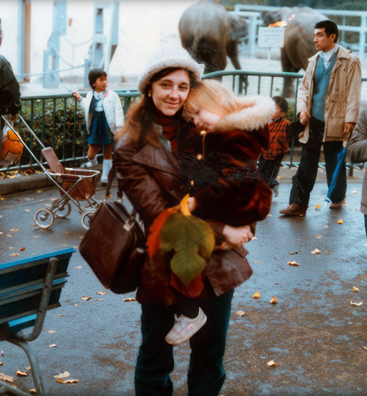 Christina, age 3, too tired to walk at the Ueno park Zoo in Ueno, Japan. November 1984.
