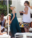 Christina_Aguilera_and_Kim_Kardashian_lounge_by_the_pool_for_a_friends_bachelor_party_at_the_Fountainebleau_in_Miami_-_June_12_-_Christina_Aguilera_Daily_00006.jpg