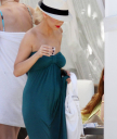 Christina_Aguilera_and_Kim_Kardashian_lounge_by_the_pool_for_a_friends_bachelor_party_at_the_Fountainebleau_in_Miami_-_June_12_-_Christina_Aguilera_Daily_00013.jpg