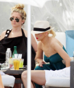 Christina_Aguilera_and_Kim_Kardashian_lounge_by_the_pool_for_a_friends_bachelor_party_at_the_Fountainebleau_in_Miami_-_June_12_-_Christina_Aguilera_Daily_00028.jpg