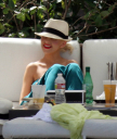 Christina_Aguilera_and_Kim_Kardashian_lounge_by_the_pool_for_a_friends_bachelor_party_at_the_Fountainebleau_in_Miami_-_June_12_-_Christina_Aguilera_Daily_00035.jpg