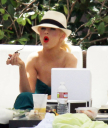 Christina_Aguilera_and_Kim_Kardashian_lounge_by_the_pool_for_a_friends_bachelor_party_at_the_Fountainebleau_in_Miami_-_June_12_-_Christina_Aguilera_Daily_00038.jpg