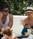 Christina_Aguilera_and_Kim_Kardashian_lounge_by_the_pool_for_a_friends_bachelor_party_at_the_Fountainebleau_in_Miami_-_June_12_-_Christina_Aguilera_Daily_00044.jpg