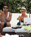 Christina_Aguilera_and_Kim_Kardashian_lounge_by_the_pool_for_a_friends_bachelor_party_at_the_Fountainebleau_in_Miami_-_June_12_-_Christina_Aguilera_Daily_00045.jpg