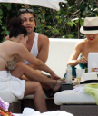 Christina_Aguilera_and_Kim_Kardashian_lounge_by_the_pool_for_a_friends_bachelor_party_at_the_Fountainebleau_in_Miami_-_June_12_-_Christina_Aguilera_Daily_00058.jpg