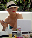 Christina_Aguilera_and_Kim_Kardashian_lounge_by_the_pool_for_a_friends_bachelor_party_at_the_Fountainebleau_in_Miami_-_June_12_-_Christina_Aguilera_Daily_00060.jpg