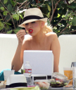 Christina_Aguilera_and_Kim_Kardashian_lounge_by_the_pool_for_a_friends_bachelor_party_at_the_Fountainebleau_in_Miami_-_June_12_-_Christina_Aguilera_Daily_00062.jpg