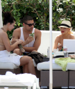 Christina_Aguilera_and_Kim_Kardashian_lounge_by_the_pool_for_a_friends_bachelor_party_at_the_Fountainebleau_in_Miami_-_June_12_-_Christina_Aguilera_Daily_00063.jpg