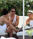 Christina_Aguilera_and_Kim_Kardashian_lounge_by_the_pool_for_a_friends_bachelor_party_at_the_Fountainebleau_in_Miami_-_June_12_-_Christina_Aguilera_Daily_00064.jpg