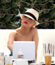 Christina_Aguilera_and_Kim_Kardashian_lounge_by_the_pool_for_a_friends_bachelor_party_at_the_Fountainebleau_in_Miami_-_June_12_-_Christina_Aguilera_Daily_00065.jpg