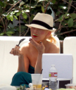 Christina_Aguilera_and_Kim_Kardashian_lounge_by_the_pool_for_a_friends_bachelor_party_at_the_Fountainebleau_in_Miami_-_June_12_-_Christina_Aguilera_Daily_00066.jpg