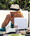 Christina_Aguilera_and_Kim_Kardashian_lounge_by_the_pool_for_a_friends_bachelor_party_at_the_Fountainebleau_in_Miami_-_June_12_-_Christina_Aguilera_Daily_00067.jpg