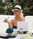 Christina_Aguilera_and_Kim_Kardashian_lounge_by_the_pool_for_a_friends_bachelor_party_at_the_Fountainebleau_in_Miami_-_June_12_-_Christina_Aguilera_Daily_00105.jpg