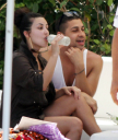 Christina_Aguilera_and_Kim_Kardashian_lounge_by_the_pool_for_a_friends_bachelor_party_at_the_Fountainebleau_in_Miami_-_June_12_-_Christina_Aguilera_Daily_00114.jpg
