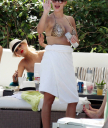 Christina_Aguilera_and_Kim_Kardashian_lounge_by_the_pool_for_a_friends_bachelor_party_at_the_Fountainebleau_in_Miami_-_June_12_-_Christina_Aguilera_Daily_00115.jpg