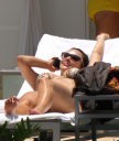 Christina_Aguilera_and_Kim_Kardashian_lounge_by_the_pool_for_a_friends_bachelor_party_at_the_Fountainebleau_in_Miami_-_June_12_-_Christina_Aguilera_Daily_00117.jpg