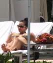 Christina_Aguilera_and_Kim_Kardashian_lounge_by_the_pool_for_a_friends_bachelor_party_at_the_Fountainebleau_in_Miami_-_June_12_-_Christina_Aguilera_Daily_00121.jpg