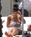 Christina_Aguilera_and_Kim_Kardashian_lounge_by_the_pool_for_a_friends_bachelor_party_at_the_Fountainebleau_in_Miami_-_June_12_-_Christina_Aguilera_Daily_00122.jpg