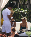 Christina_Aguilera_and_Kim_Kardashian_lounge_by_the_pool_for_a_friends_bachelor_party_at_the_Fountainebleau_in_Miami_-_June_12_-_Christina_Aguilera_Daily_00136.jpg