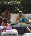 Christina_Aguilera_and_Kim_Kardashian_lounge_by_the_pool_for_a_friends_bachelor_party_at_the_Fountainebleau_in_Miami_-_June_12_-_Christina_Aguilera_Daily_00140.jpg