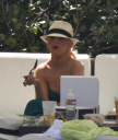 Christina_Aguilera_and_Kim_Kardashian_lounge_by_the_pool_for_a_friends_bachelor_party_at_the_Fountainebleau_in_Miami_-_June_12_-_Christina_Aguilera_Daily_00143.jpg