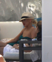 Christina_Aguilera_and_Kim_Kardashian_lounge_by_the_pool_for_a_friends_bachelor_party_at_the_Fountainebleau_in_Miami_-_June_12_-_Christina_Aguilera_Daily_00147.jpg